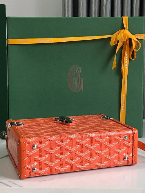 CASSETTE TRUNK BAG 21 IN RED GOYARDINE CANVAS & CLAMECY COWHIDE